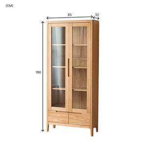 a tall wooden cabinet with glass doors