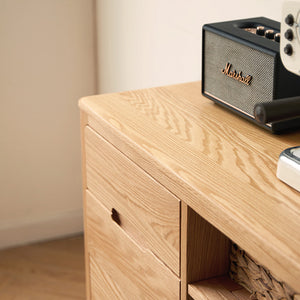 a wooden table with a radio on top of it