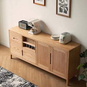 a wooden cabinet with a coffee maker on top of it