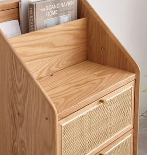 a wooden desk with a magazine rack on top of it