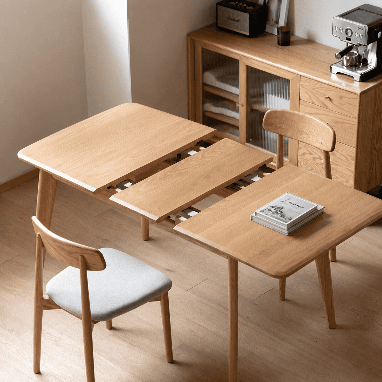 Bremen solid oak extending dining table with pull-out extension design and natural wood grain finish
