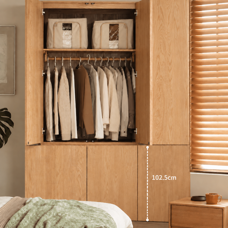 Clovis natural oak wardrobe open with hanging clothes, top shelves and 102.5 cm door section