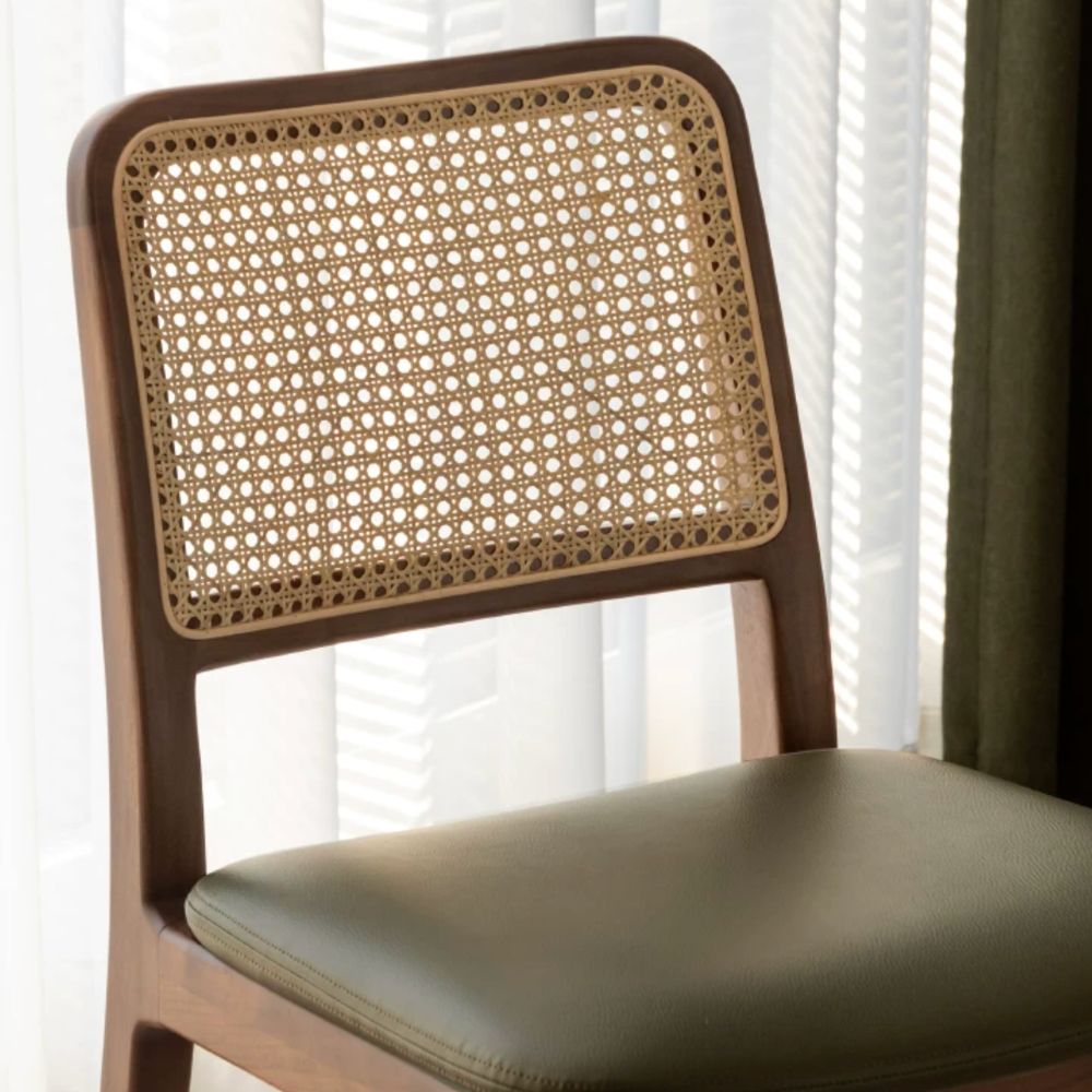 Ely Natural Solid Walnut Dining Chair styled with dining table in a contemporary home