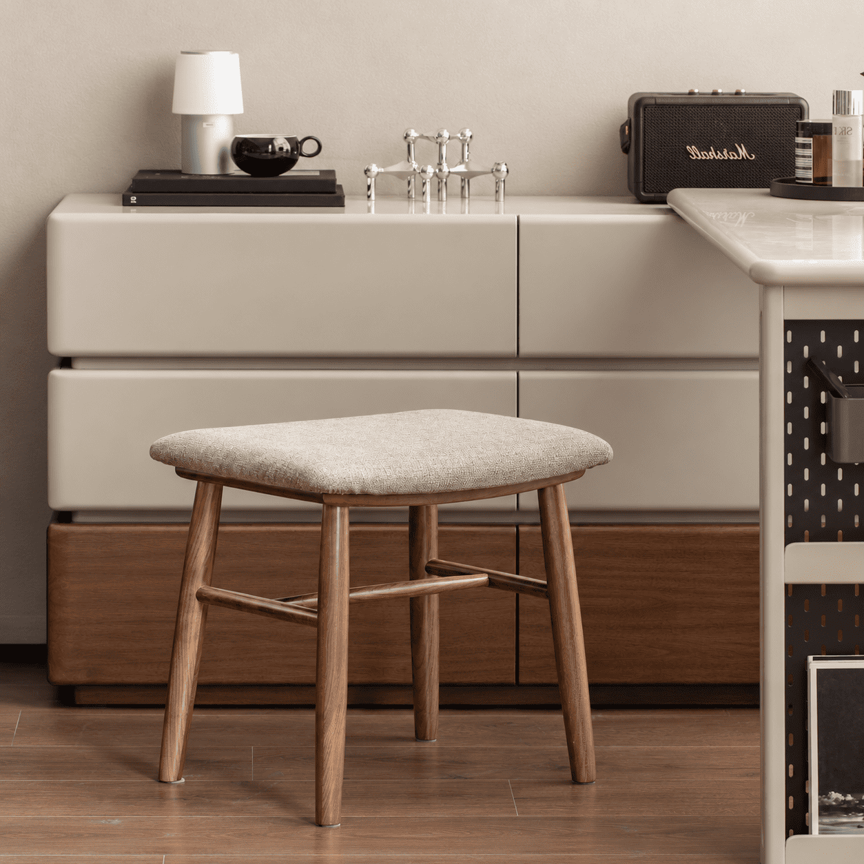 Graz walnut dressing stool with beige cushion, tapered legs and crossbar support