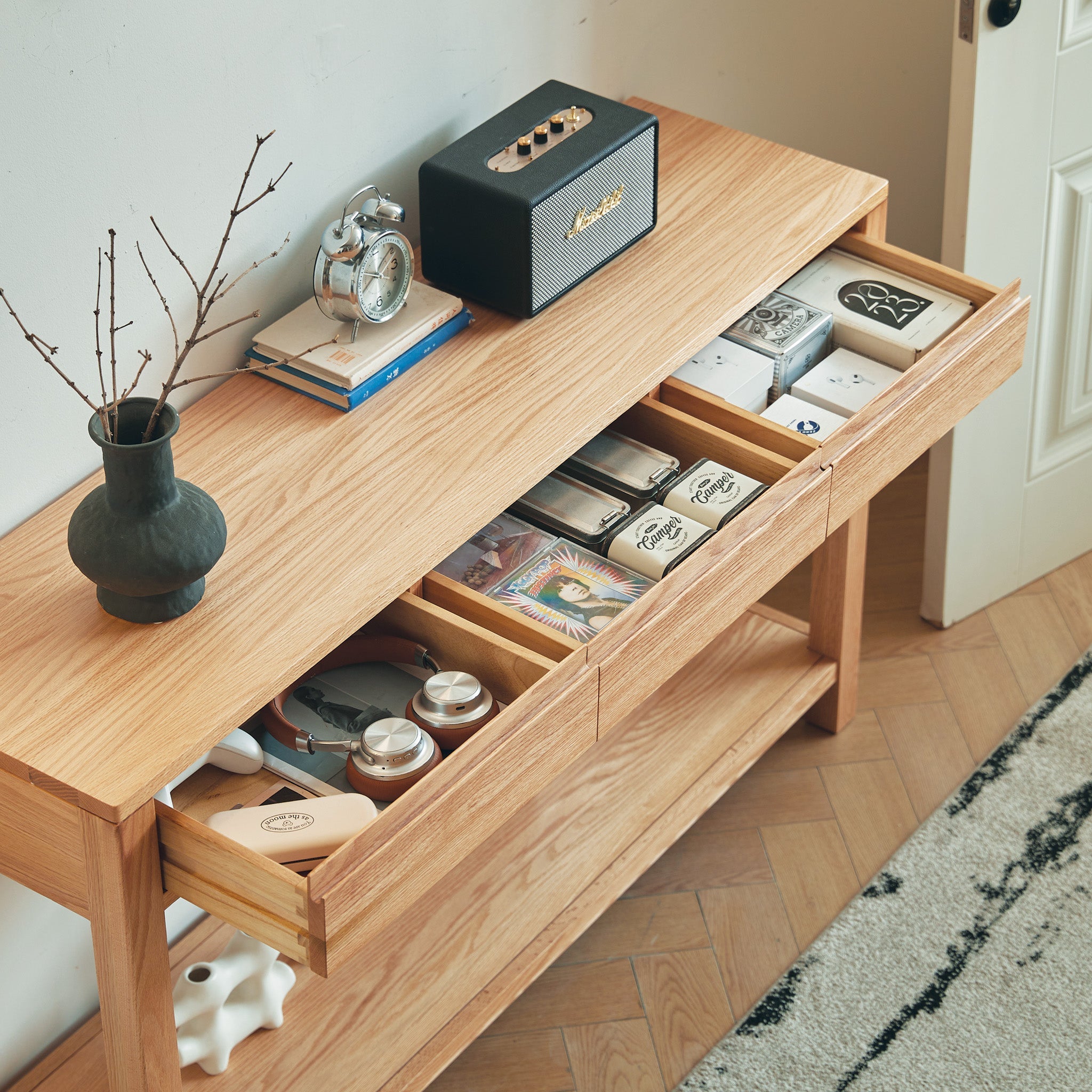 Humbie natural solid oak console table with drawers and lower shelf styled as a hallway table in a Kiwi home