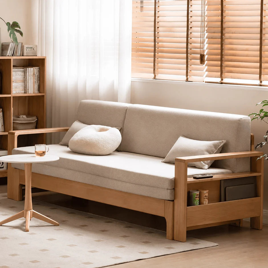 Natural solid oak sofa bed with cream upholstery for lounge room, guest room, and everyday seating