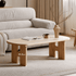 Irving natural solid oak coffee table with ceramic top styled in front of a beige sofa