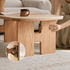 Irving natural oak coffee table with ceramic top and woven baskets stored underneath