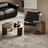 Lifestyle view of Jelling coffee table and side table set in walnut colour beside lounge seating