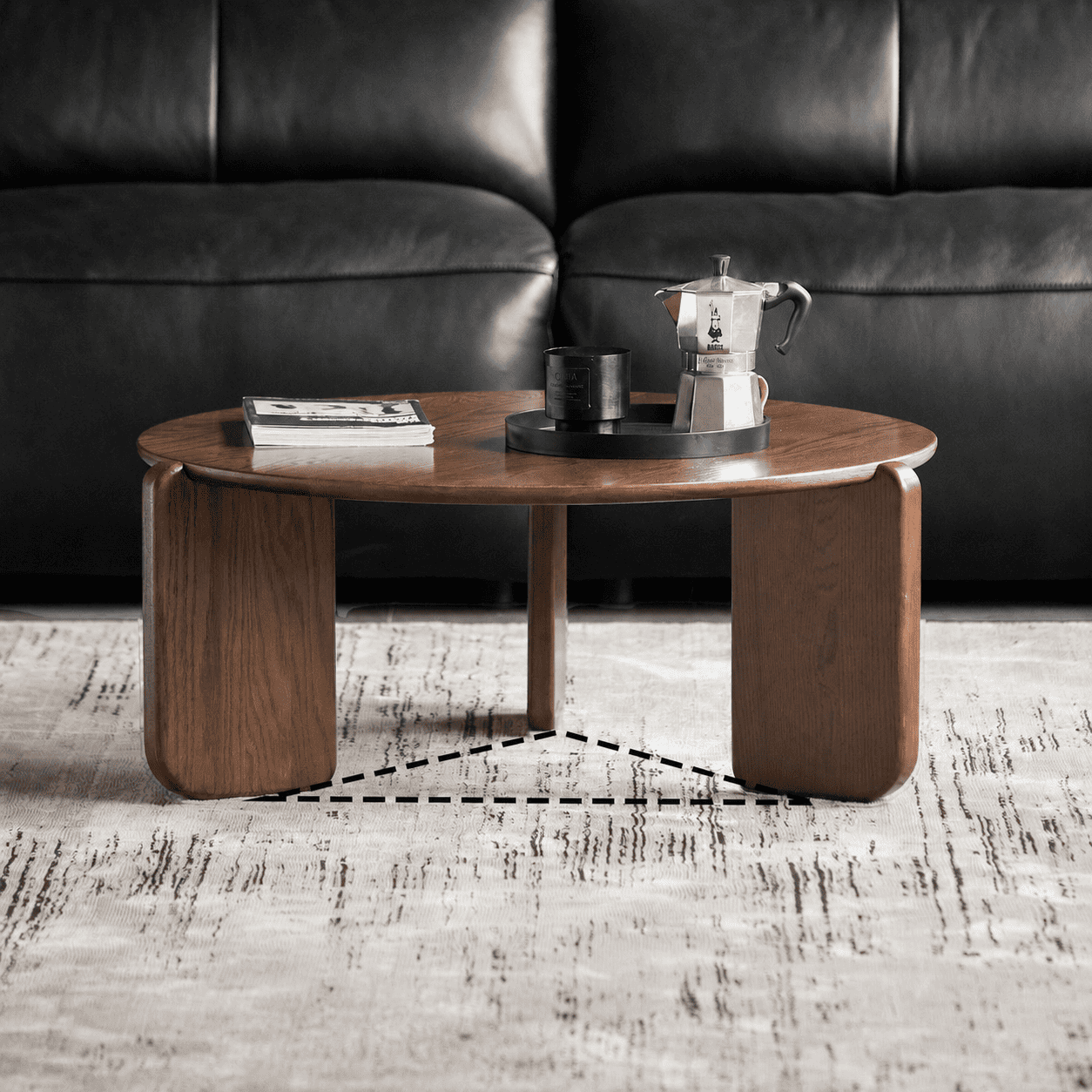 Jelling walnut-coloured solid oak side table with black round top and lower storage shelf