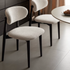 Solid oak dining chair with charcoal finish legs and textured fabric upholstery for modern dining rooms