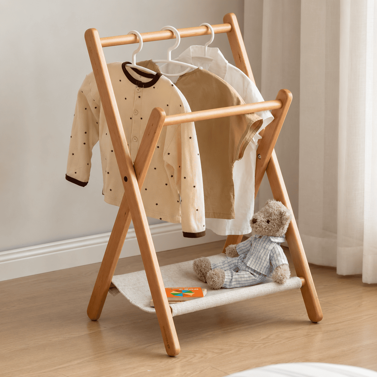 Naila natural solid beech coat rack used for children’s clothes and toy storage