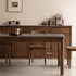 Solid walnut dining table with sleek ceramic top and warm natural wood frame