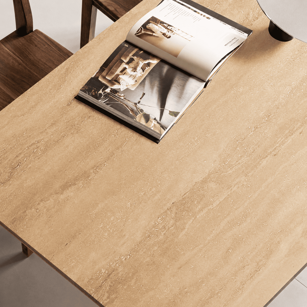 Solid walnut dining table paired with matching bench and chair in a refined dining space