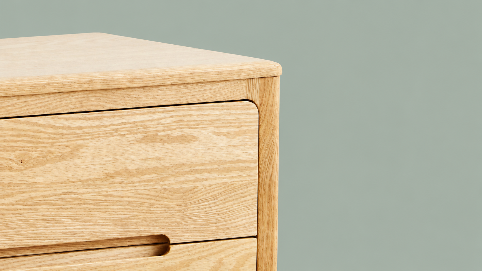 Close-up of the Seattle Solid Oak Furniture Collection showing natural oak grain, rounded drawer detail, and clean modern craftsmanship