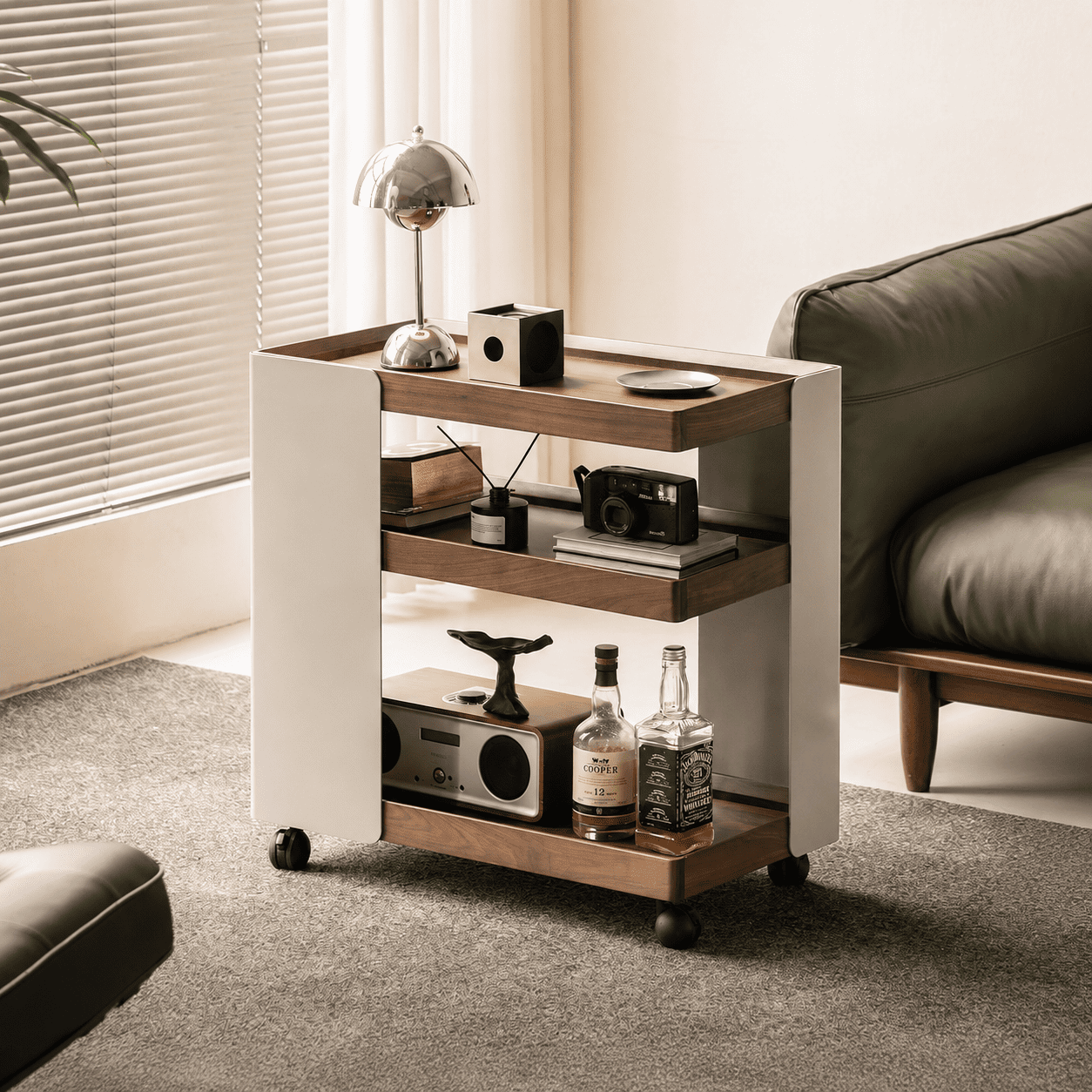 Toledo natural solid walnut movable side table with cream side panels, three shelves and caster wheels