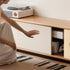 Tonnac solid cherry entertainment unit with drawers, glass shelving and modern retro design in a Kiwi living room
