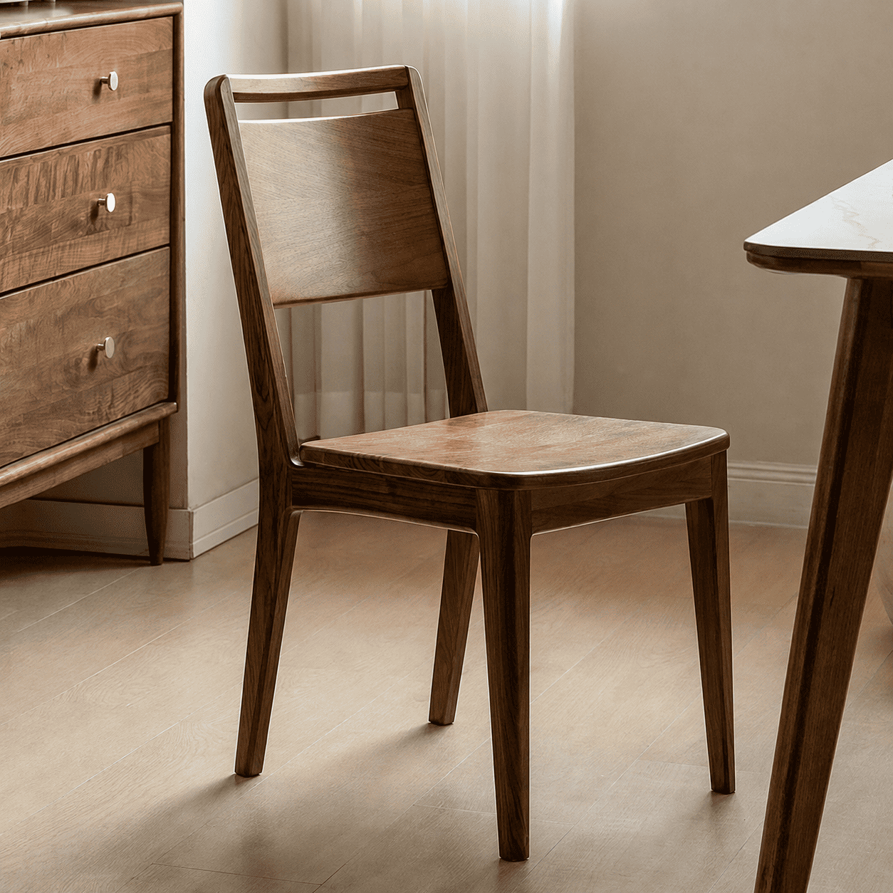 Truro Natural Solid Walnut Dining Chair styled with walnut dining table in a warm dining room