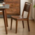 Natural solid walnut chair paired with dining table for everyday family meals