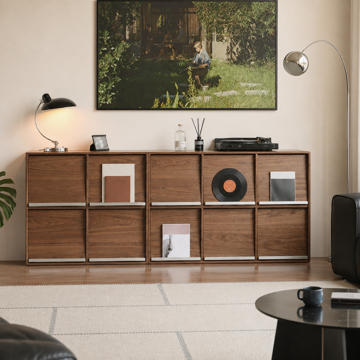 Walnut modular sideboard with sliding panels and metal rail details styled in a contemporary living room.