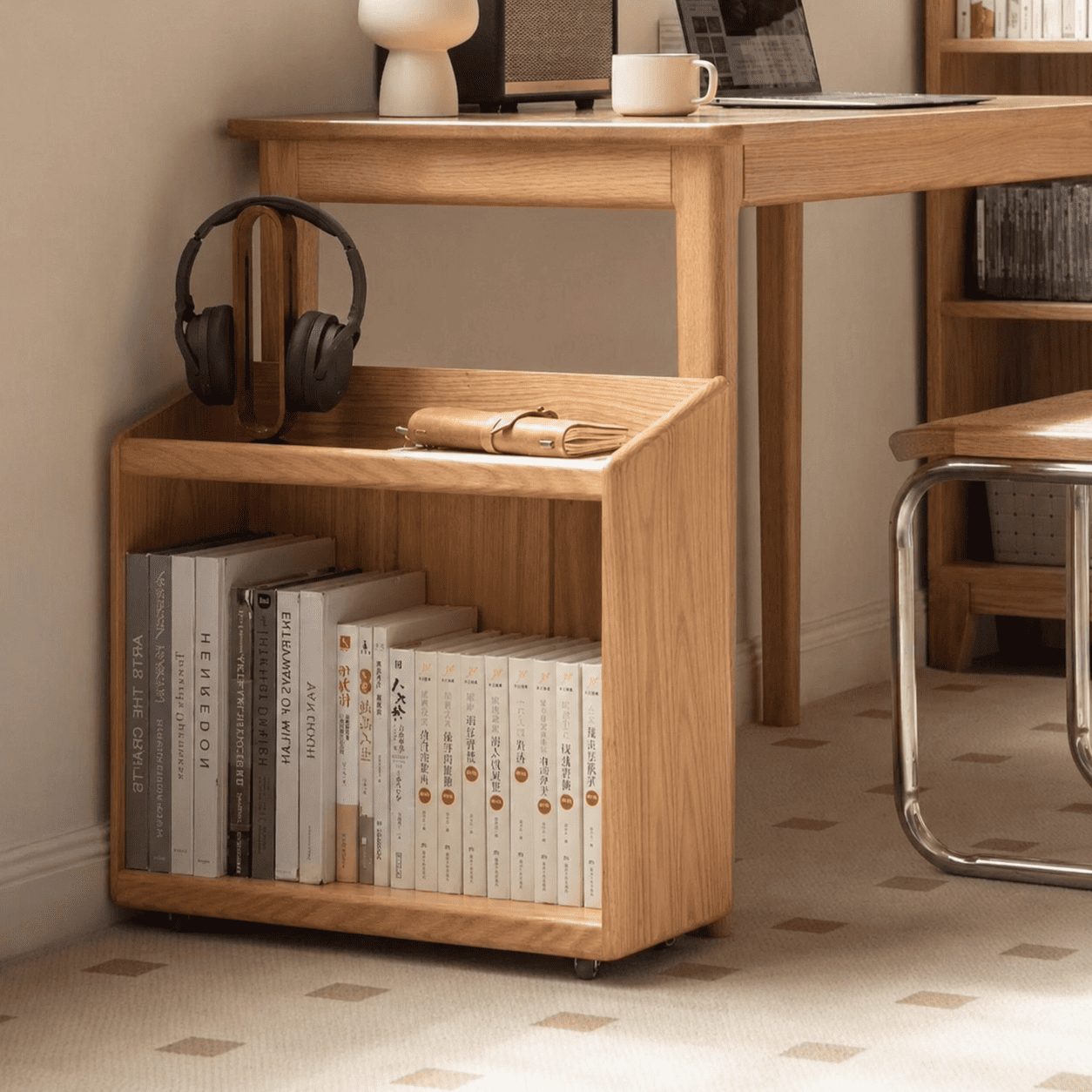 Mobile wooden storage unit with open shelves and caster wheels for flexible home organisation.