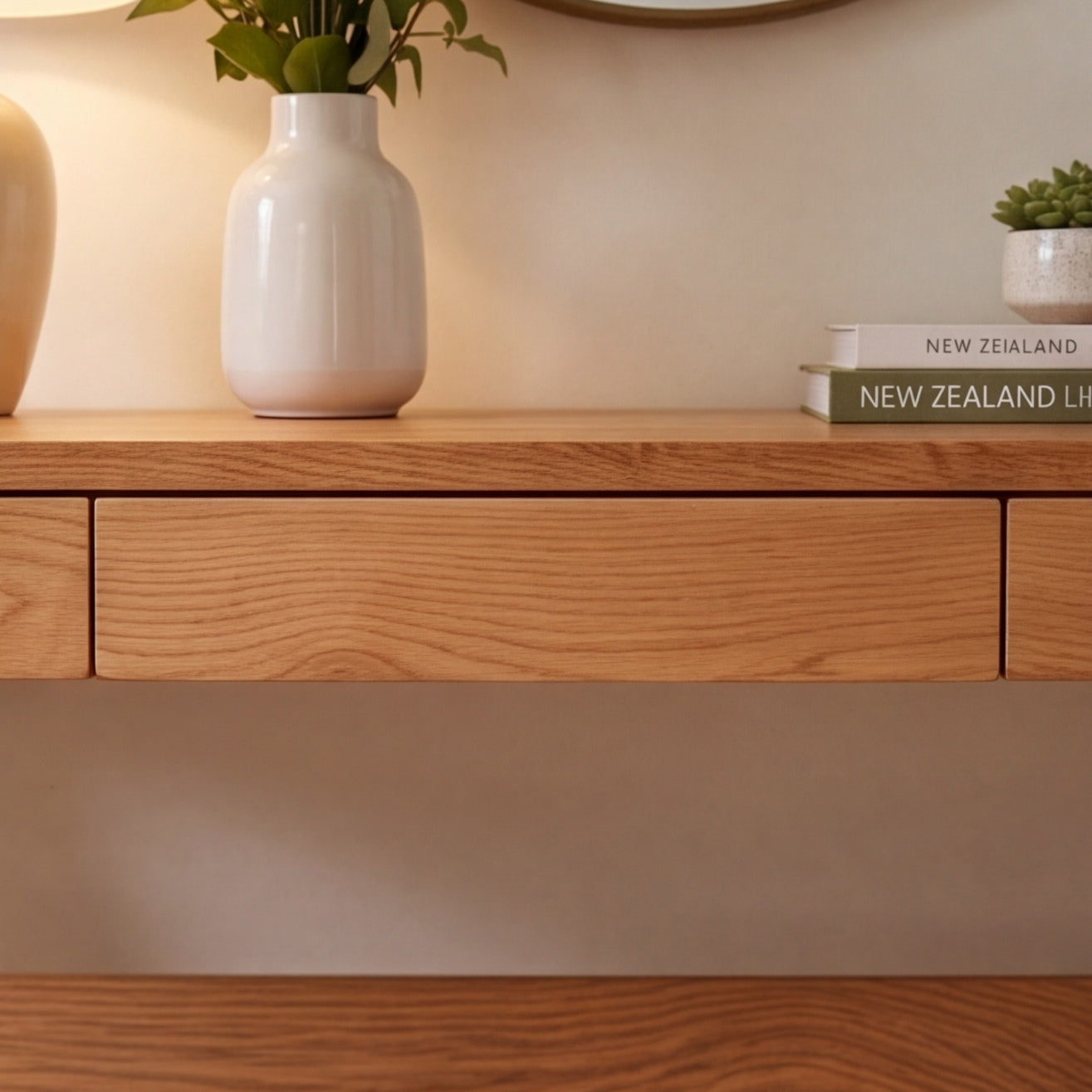 Solid oak console table with practical drawers and lower shelf for modern home organisation