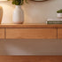Solid oak console table with practical drawers and lower shelf for modern home organisation