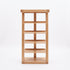 Zetland Natural Solid Oak Large Bookshelf styled with books, plants, and home décor in a bright living room