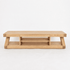 Large oak TV stand with open shelf storage for media players, books, and living room décor
