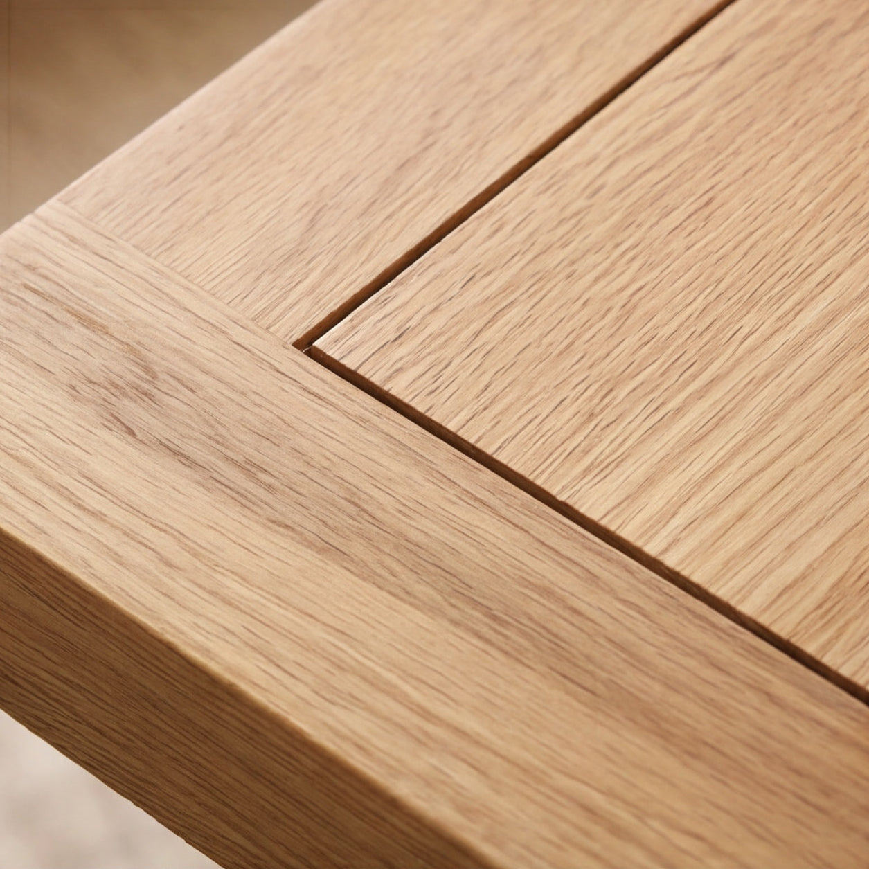 Zetland oak nesting tables with space-saving stacked design and warm natural finish