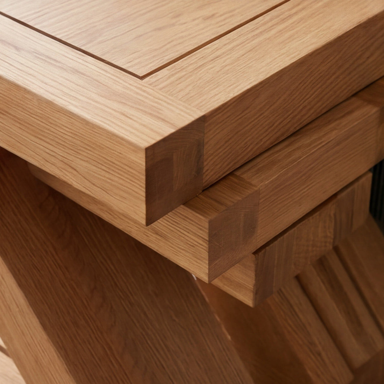 Solid oak nest of tables with natural wood grain for compact living room furniture
