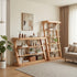Natural solid oak shelving unit paired with leather armchair and indoor plant in a cosy lounge