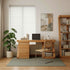 Natural solid oak workstation styled in a cosy study room with bookshelf and indoor plant