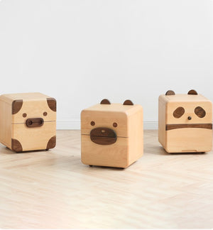 a group of wooden toys sitting on top of a wooden floor