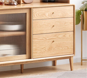 a close up of a wooden cabinet with glass doors